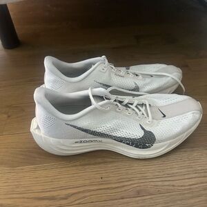 Nike White and Black Athletic Sneakers with Subtle Tan Accent